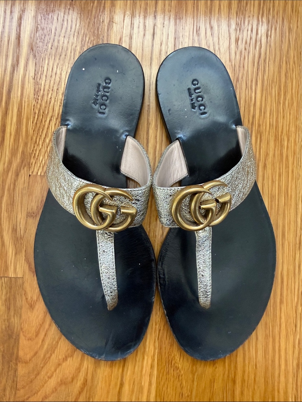 Gucci Metallic Gold and Black GG Thong Sandals